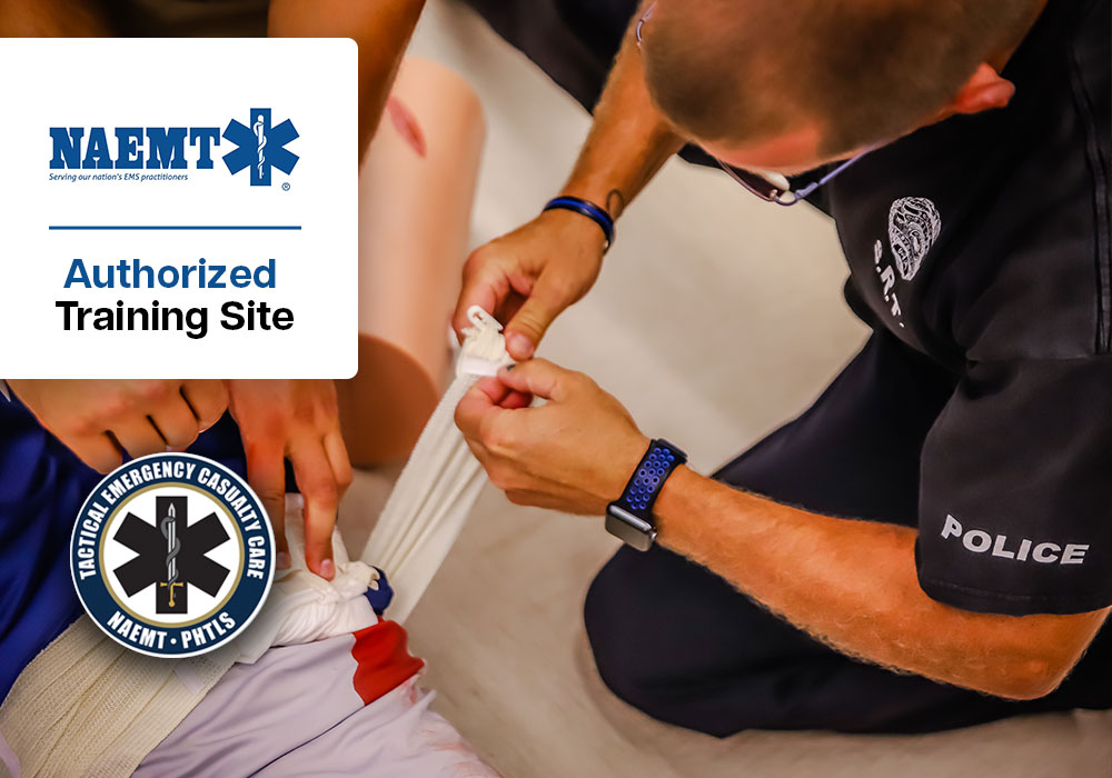 EMS Tourniquet Application Training EMS professionals practicing tourniquet application in a medical training simulation